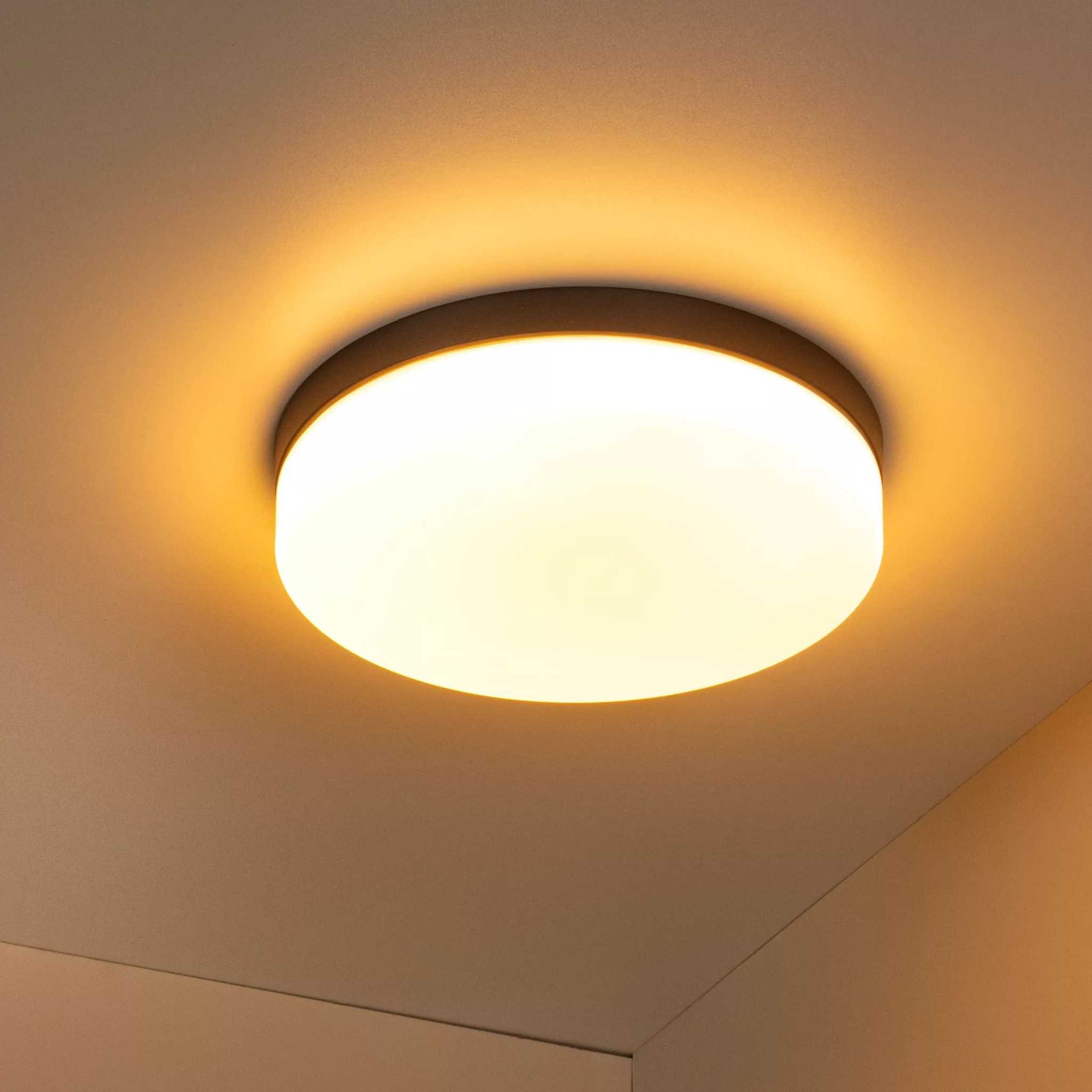 Lucide Biskit - plafonnier avec détecteur de mouvement - Ø 34,5 x 7,5 cm - 24W LED inclus - IP44 - noir