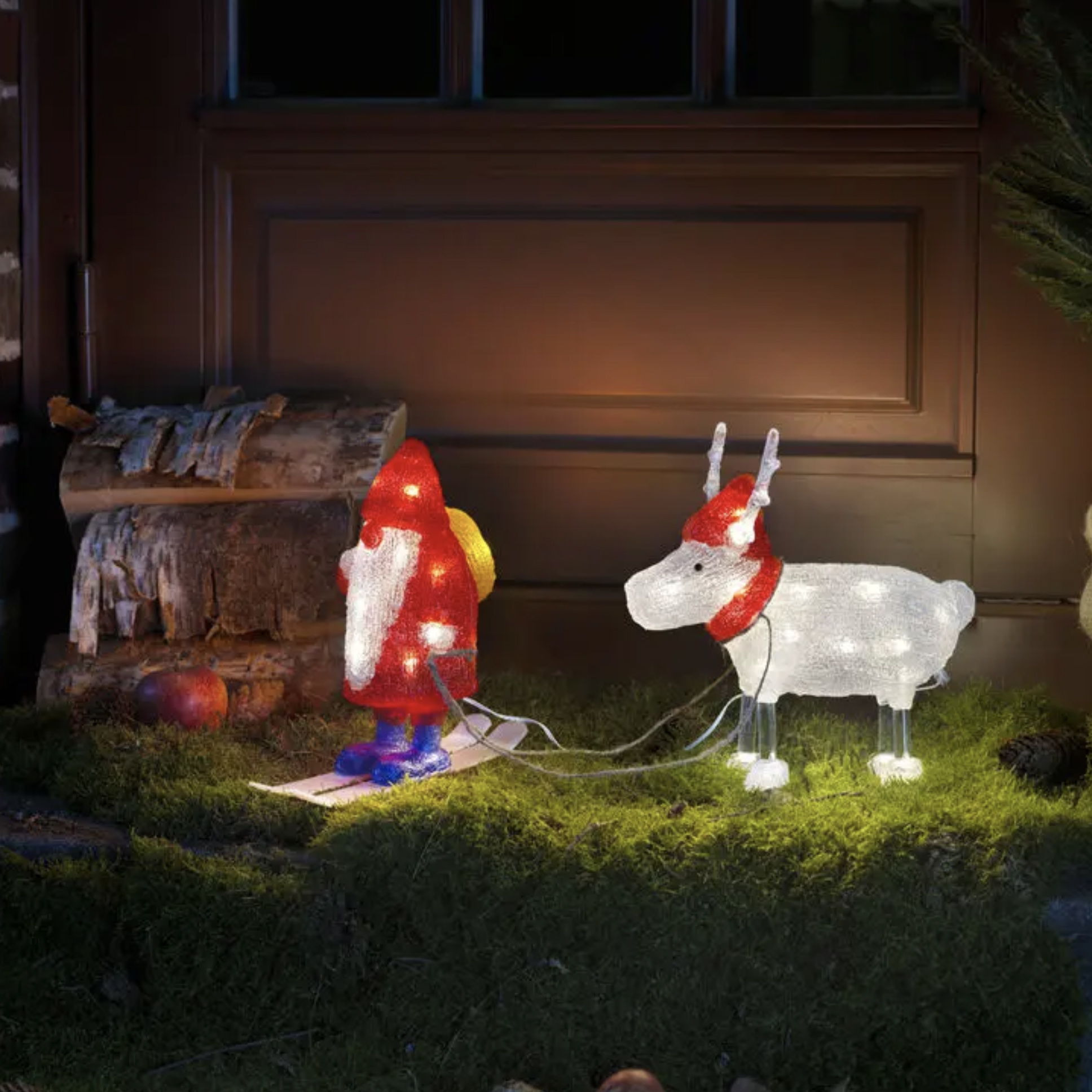 Konstsmide Lumières de Noël - Père Noël et rennes - x 23,5 cm - IP44 - transparent et rouge
