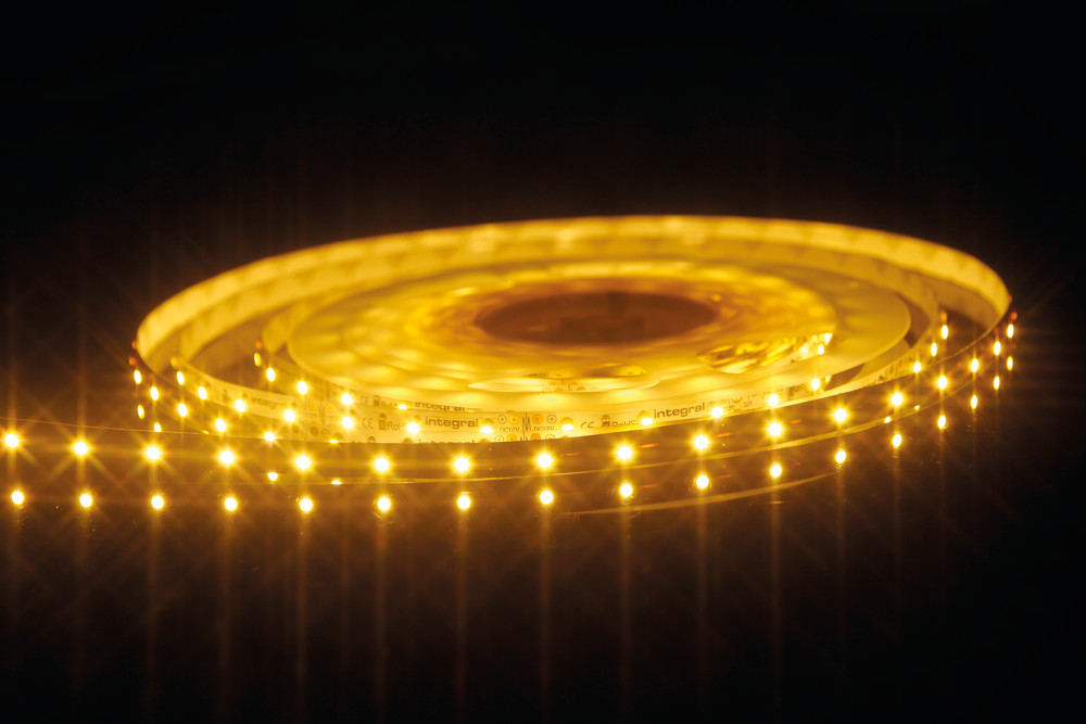 Bande LED intégrale - largeur 1cm, longueur - 24Vdc - 12 Watt par mètre - IP20 - 3000K